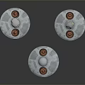 Three Metallic Disc Shaped Objects With Shiny Surface And Red Circular Elements On Dark Background